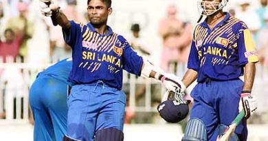 Sri Lankan batsman Romesh Kaluwitharena celebrates as he completes his century during his knock of unbeaten 102 runs against England during the third and final one-day international in Colombo, Sri Lanka on Tuesday, March. 27,2001. Sri Lanka beat England by 10 wickets to win the three match series 3-0.(Photo Leo de Lile)
