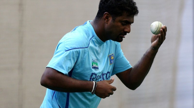 Muttiah Muralitharan prepares to bowl © Getty Images