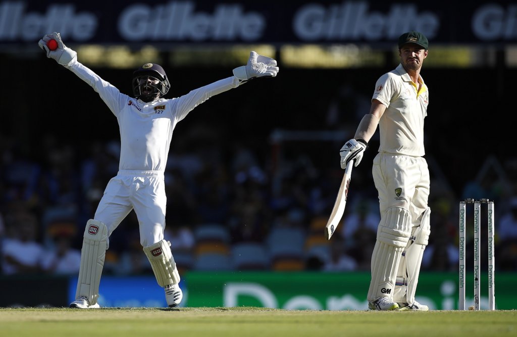 Travis Head unimpressed by Niroshan Dickwella's animated appeal © Getty Images