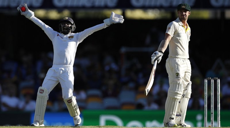 Travis Head unimpressed by Niroshan Dickwella's animated appeal © Getty Images