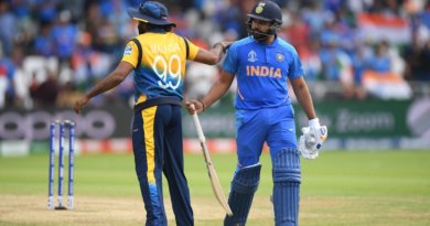 Rohit Sharma is given a pat on the back by Lasith Malinga as he walks back to the pavilion © Getty Images