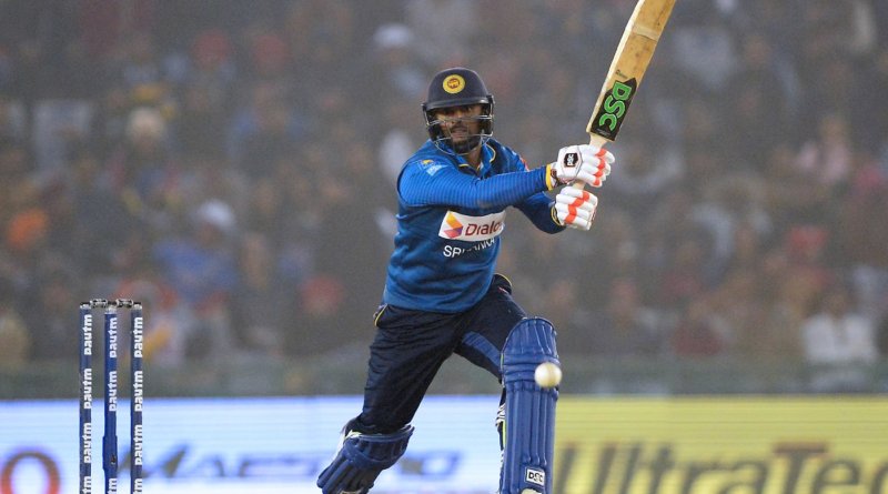 Sri Lanka batsman Asela Gunaratne plays a shot during the second One Day International (ODI) cricket match between India and Sri Lanka at The Punjab Cricket Association Stadium in Mohali on December 13, 2017. / AFP PHOTO / SAJJAD HUSSAIN / ----IMAGE RESTRICTED TO EDITORIAL USE - STRICTLY NO COMMERCIAL USE----- / GETTYOUT