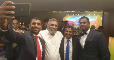 Sri Lankan Cricketers clicked Selfie with Election Commission Chairman Mahinda Deshapriya.