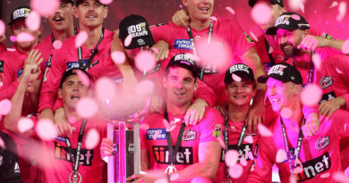 The Sydney Sixers players soak in the win © Getty Images