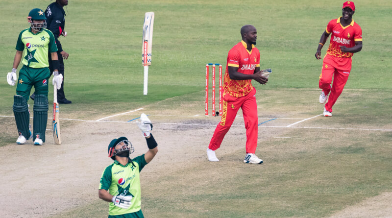 Zimbabwe's Luke Jongwe (2nd R) celebrates after the dismissal of Pakistan's Mohammad Rizwan (C) as he reacts during the second Twenty20 international cricket match between Zimbabwe and Pakistan at the Harare Sports Club in Harare on April 23, 2021. (Photo by Jekesai NJIKIZANA / AFP) (Photo by JEKESAI NJIKIZANA/AFP via Getty Images)