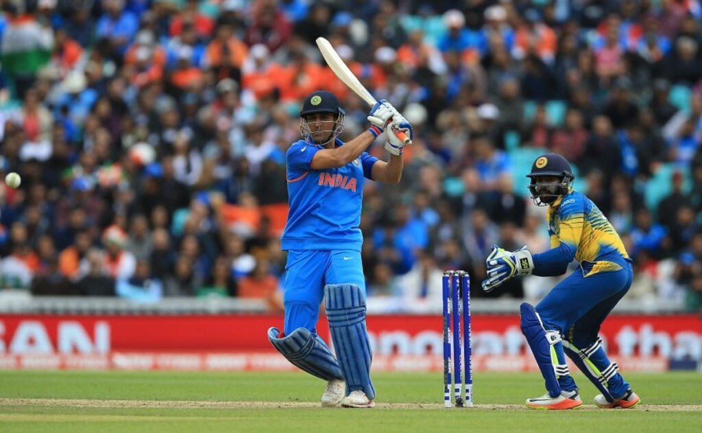 And finally, MS Dhoni struck a fifty to help India finish a healthy 321 for 6 in 50 overs © PA Photos