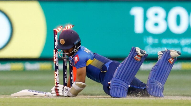 Kusal Mendis collides with the stumps as he looks to complete a run © Getty Images