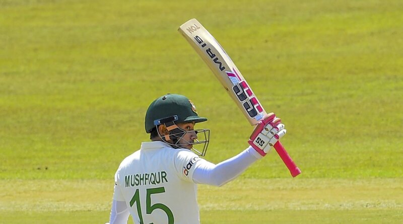 Mushfiqur Rahim celebrates his fifty on the third morning © AFP/Getty Images