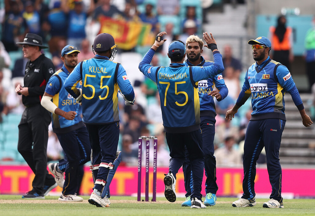 LONDON, ENGLAND - JULY 01: Wanindu Hasaranga of Sri Lanka celebrates after taking the wicket of Jonny Bairstow of England during the 2nd One Day International match between England and Sri Lanka at The Kia Oval on July 01, 2021 in London, England. (Photo by Ryan Pierse/Getty Images)