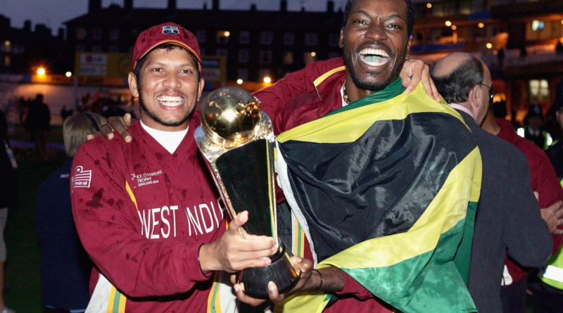 Ramnaresh Sarwan and Chris Gayle hold the Champions Trophy•Sep 25, 2004•Getty Images
