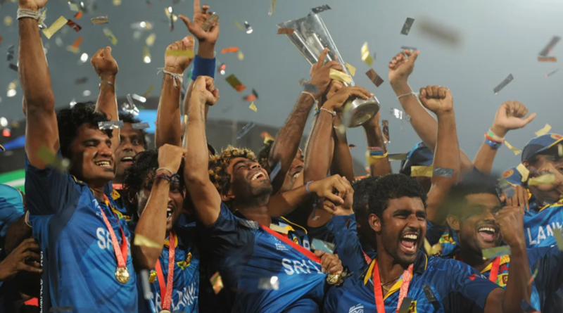 The Sri Lankan players celebrate with the World T20 trophy•Apr 06, 2014•ICC