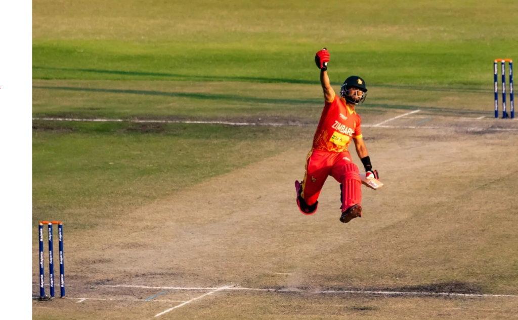Sikandar Raza leaps in celebration after registering his third hundred in six ODI innings•Aug 22, 2022•AFP/Getty Images