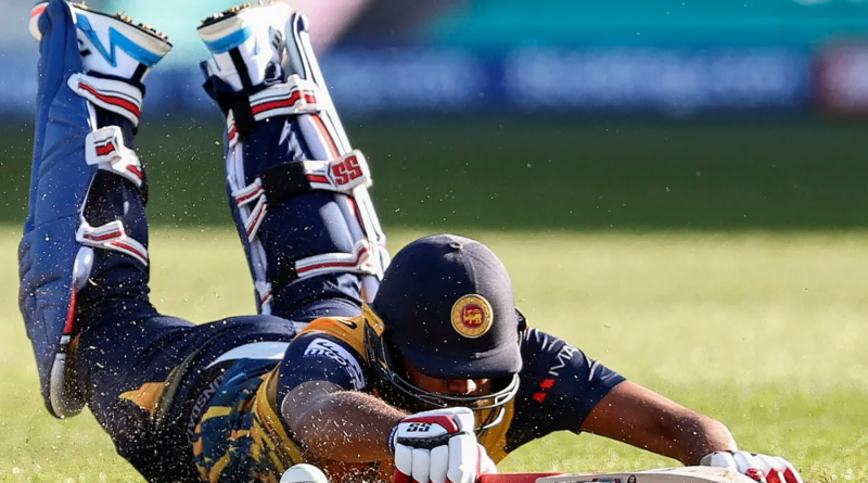 Bhanuka Rajapaksa makes a valiant dive to make it back into his crease•Oct 16, 2022•AFP/Getty Images