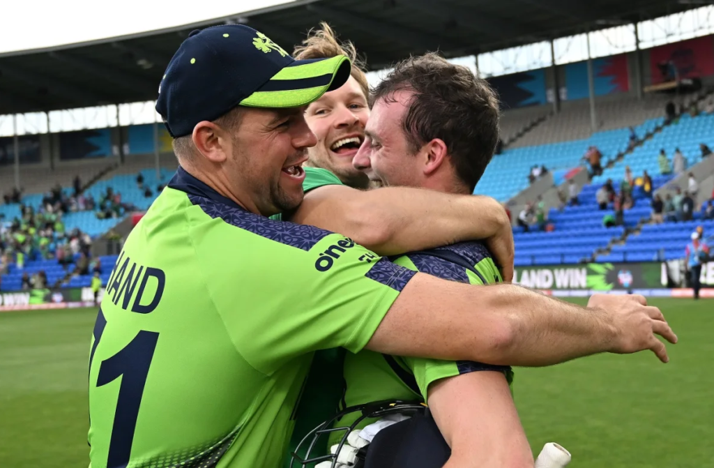 Fionn Hand, Barry McCarthy and Lorcan Tucker can't hide their emotions after Ireland toppled West Indies•Oct 21, 2022•ICC via Getty Images
