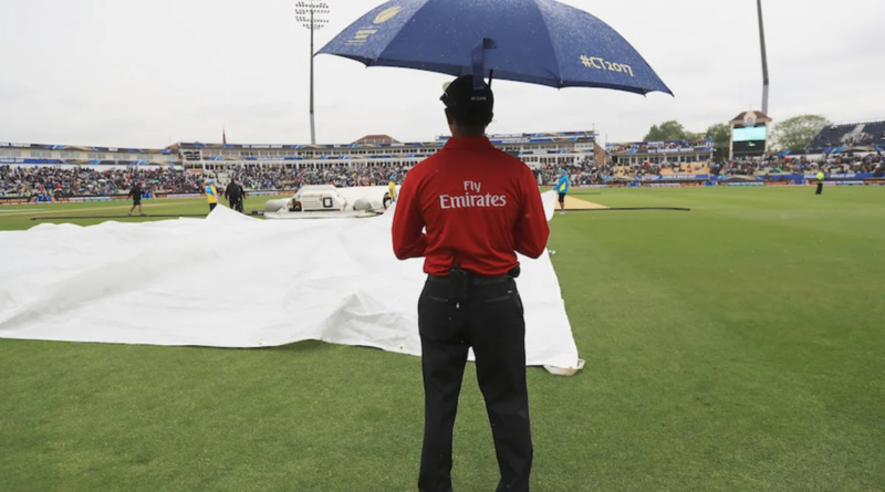 Kumar Dharamsena watches the covers being unfolded•Jun 02, 2017•Getty Images/ICC
