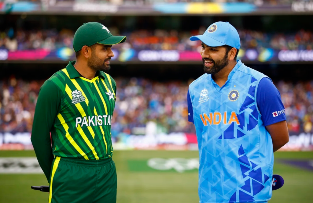 Rohit Sharma and Babar Azam catch up during the toss•Oct 23, 2022•Getty Images/ICC