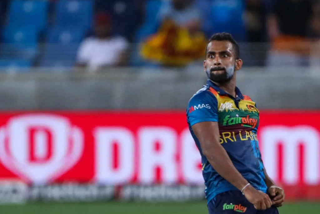 Chamika Karunaratne is pumped after getting rid of Bhuvneshwar Kumar•Sep 06, 2022•AFP/Getty Images