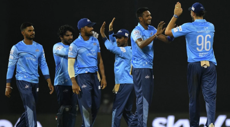 The Colombo Stars players celebrate the fall of a wicket•Dec 06, 2021•AFP/Getty Images