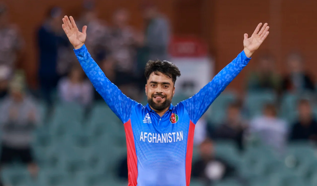 Rashid Khan was happy after dismissing Marcus Stoinis•Nov 04, 2022•Associated Press