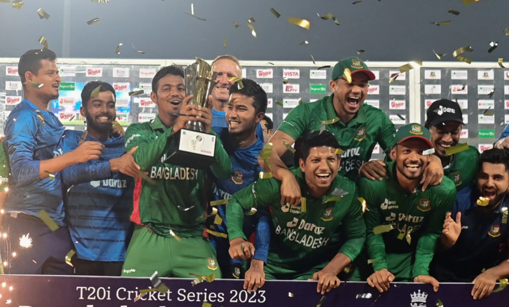 Bangladesh debutant Tanvir Islam holds the series trophy•Mar 14, 2023•AFP/Getty Images