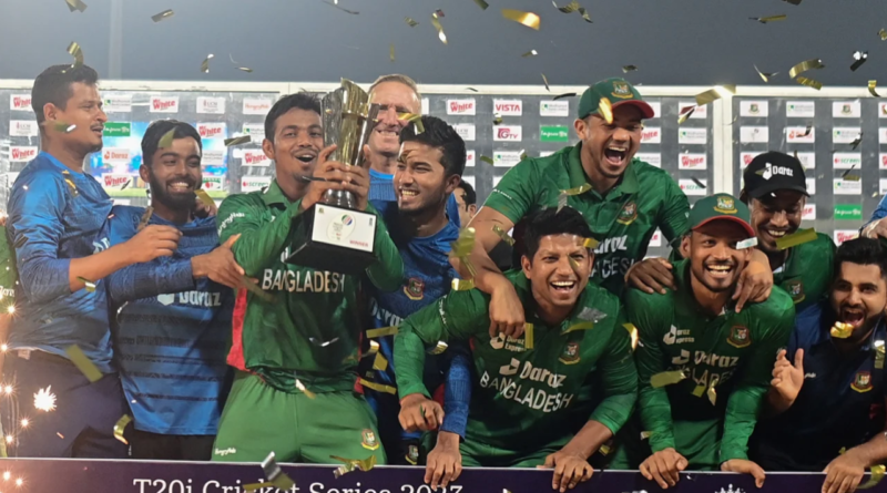 Bangladesh debutant Tanvir Islam holds the series trophy•Mar 14, 2023•AFP/Getty Images
