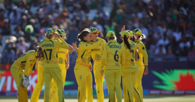 Jess Jonassen celebrates with team-mates the crucial wicket of Chole Tryon•Feb 26, 2023•AFP/Getty Images