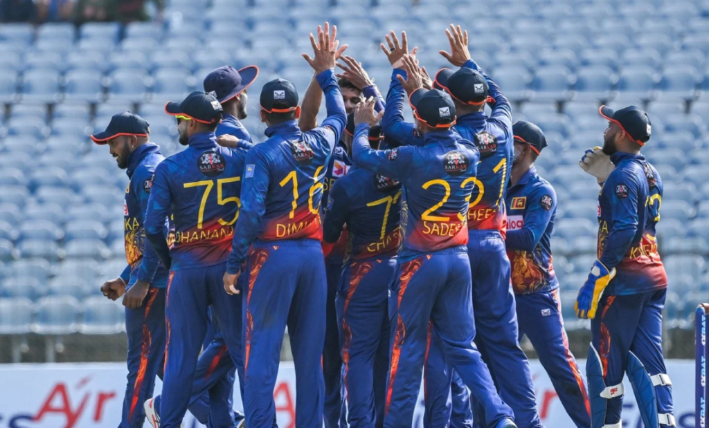 Sri Lanka get together after a wicket•Jun 04, 2023•AFP/Getty Images