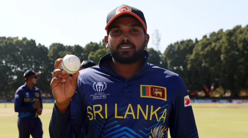 Wanindu Hasaranga holds the ball up after bagging five wickets against Oman•Jun 23, 2023•ICC/Getty Images