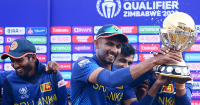 Dasun Shanaka lifts the trophy after leading Sri Lanka through an all-win run•Jul 09, 2023•ICC via Getty Images
