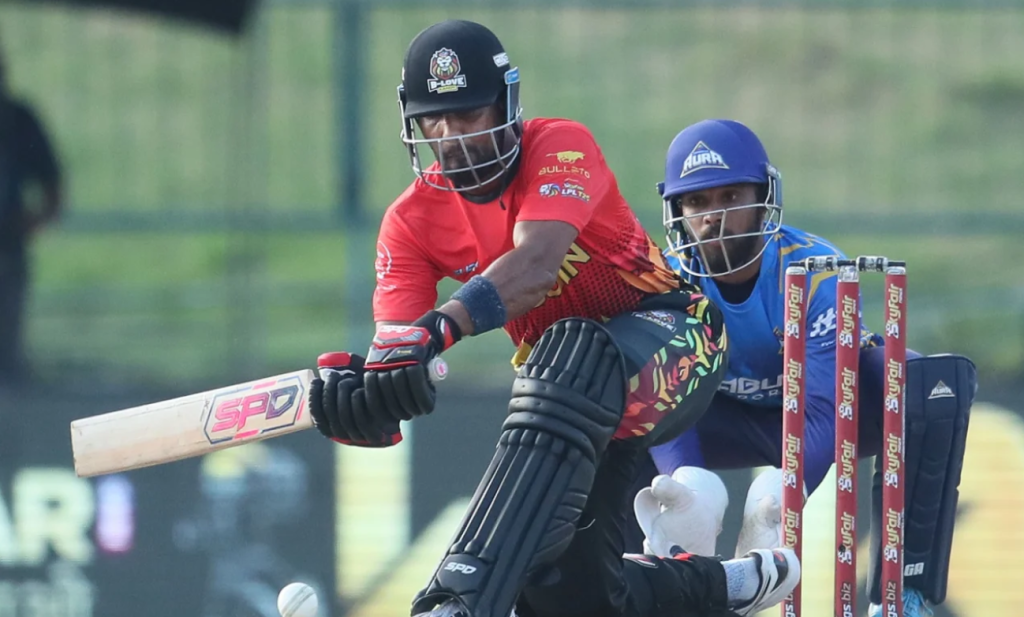 Dinesh Chandimal sweeps one during his 48-run knock•Aug 04, 2023•SLC