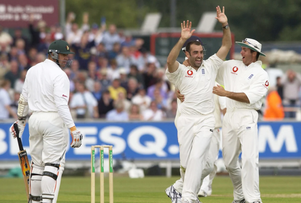 Richard Johnson celebrates taking the wicket of Heath Streak•Jun 06, 2003•Tom Shaw/Getty Images