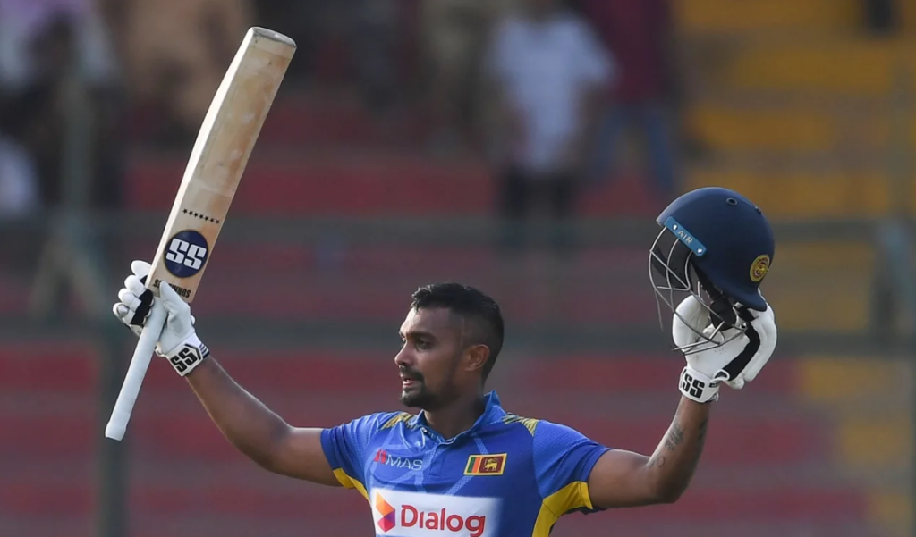 Danushka Gunathilaka raises his bat after getting to hundred•Oct 02, 2019•Getty Images