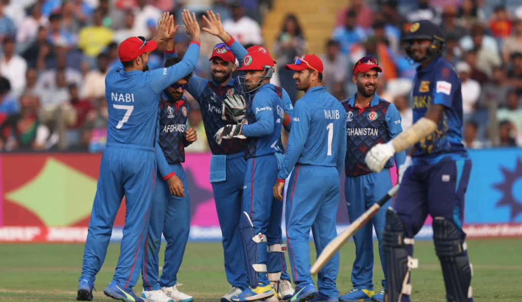Ibrahim Zadran's direct hit caught Dushmantha Chameera short•Oct 30, 2023•ICC via Getty Images