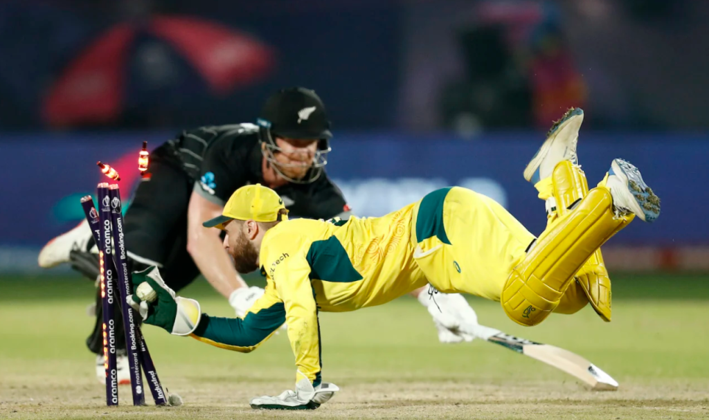 Josh Inglis ran out James Neesham to leave New Zealand needing six runs off the last ball•Oct 28, 2023•ICC/Getty Images