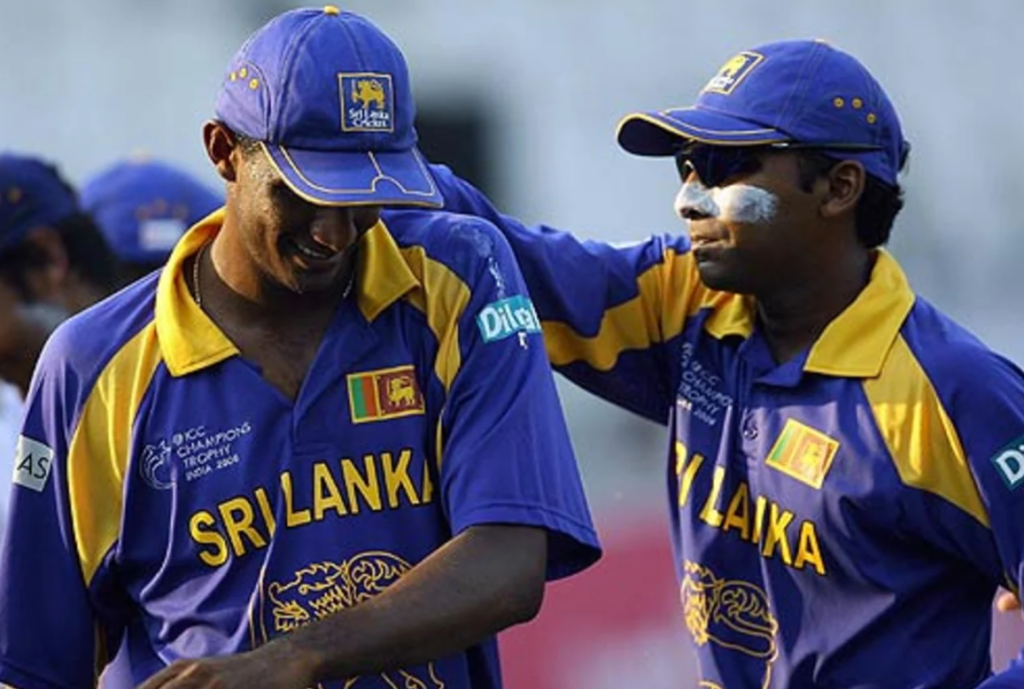 Mahela Jayawardene congratulates Farveez Maharoof after taking 6 for 14•Oct 14, 2006•AFP