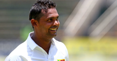 Asela Gunaratne is all smiles after bringing up his maiden Test century•Nov 07, 2016•AFP