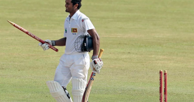 Dimuth Karunaratne takes off a stump after taking Sri Lanka to victory•Nov 19, 2012•Associated Press