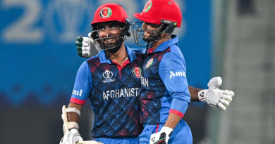 Hashmatullah Shahidi and Azmatullah Omarzai are smiles after Afghanistan's big win•Nov 03, 2023•AFP/Getty Images
