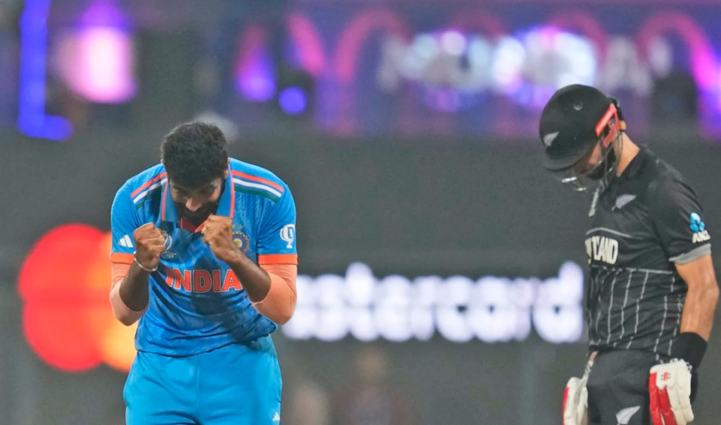 Jasprit Bumrah and Daryl Mitchell experience contrasting emotions•Nov 15, 2023•Associated Press