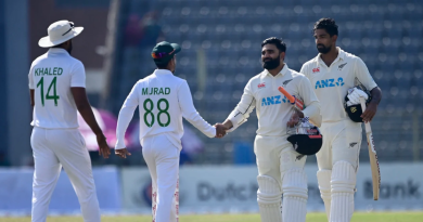 Ajaz Patel and Ish Sodhi shake hands with Hasan Murad and Khaled Ahmed after the game•Dec 02, 2023•AFP/Getty Images