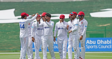Rashid Khan bumps fists with captain Asghar Afghan•Mar 13, 2021•Abu Dhabi Cricket