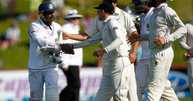 The New Zealand players congratulate Kumar Sangakkara after he is dismissed for 203•Jan 04, 2015•Getty Images