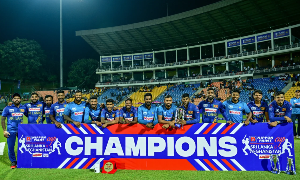 The victorious Sri Lanka squad with its spoils•Feb 14, 2024•AFP/Getty Images