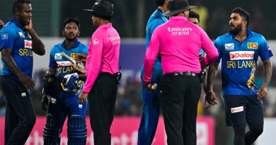 Wanindu Hasaranga and Angelo Mathews have a word with the umpire after the game•Feb 21, 2024•AFP/Getty Images