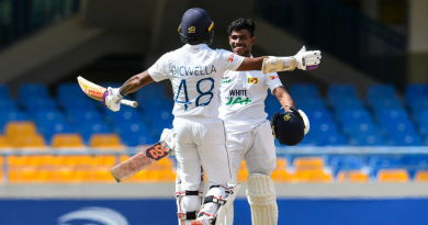 Pathum Nissanka is congratulated by Niroshan Dickwella after reaching his debut hundred•Mar 24, 2021•RANDY BROOKS/AFP/Getty Images