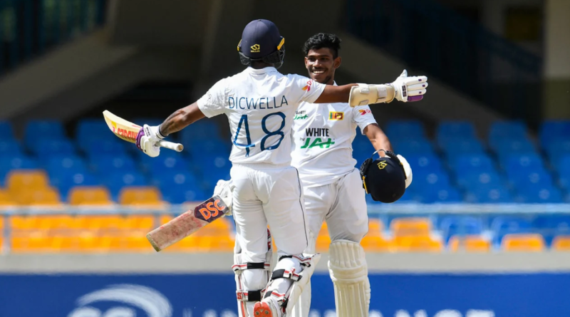 Pathum Nissanka is congratulated by Niroshan Dickwella after reaching his debut hundred•Mar 24, 2021•RANDY BROOKS/AFP/Getty Images