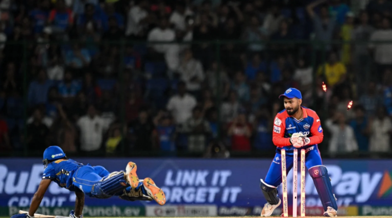 Rishabh Pant runs out Tilak Varma to wipe out Mumbai Indians' last hope•Apr 27, 2024•AFP/Getty Images